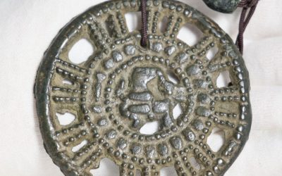 Authentic Ancient Old Tibetan thokcha showing crouching mythical beast in centre